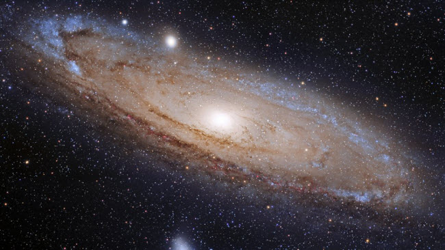 Andromeda: Our Giant Neighbor and Its Journey Towards Colliding with the Milky Way